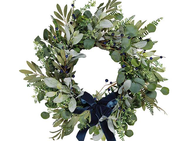 Leafy foliage Christmas wreaths with velvet bow