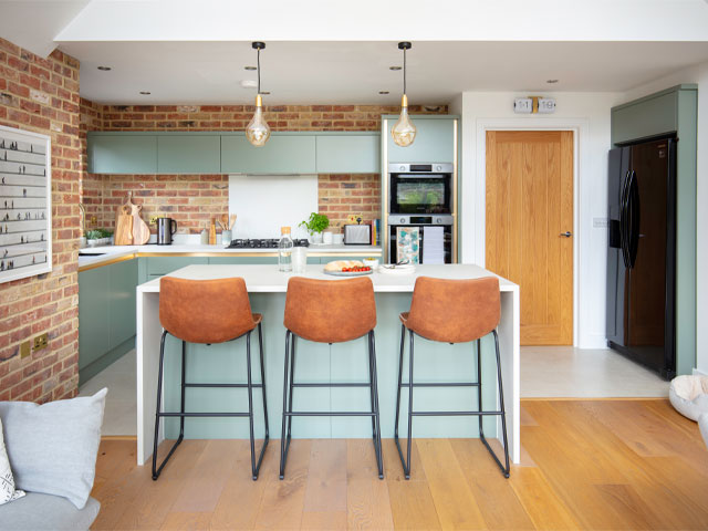 new-build kitchen with brick slips to create exposed brickwork effect