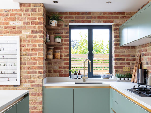 new-build kitchen remodelled to add character with faux brickwork and new cabinetry 