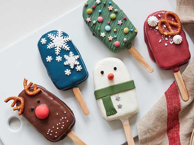 Christmas cakesickles in reindeer, snowmen and festive patterns