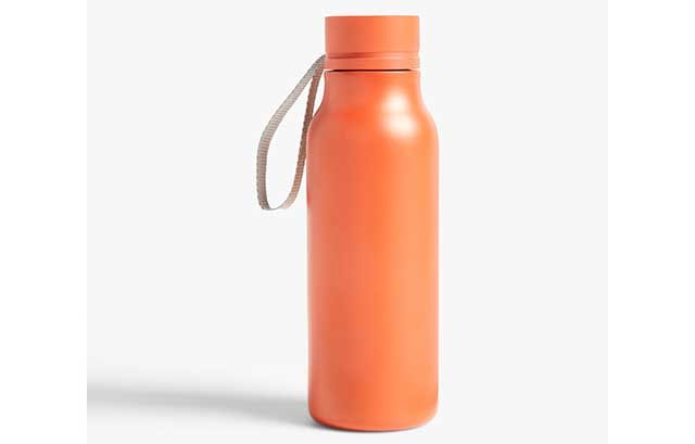 Orange water bottle on white background