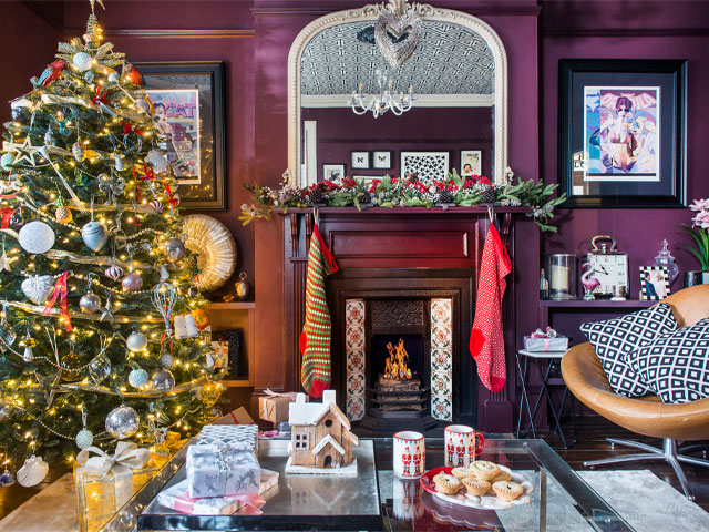 deep aubergine painted walls in a remodelled victorian house decorated for christmas