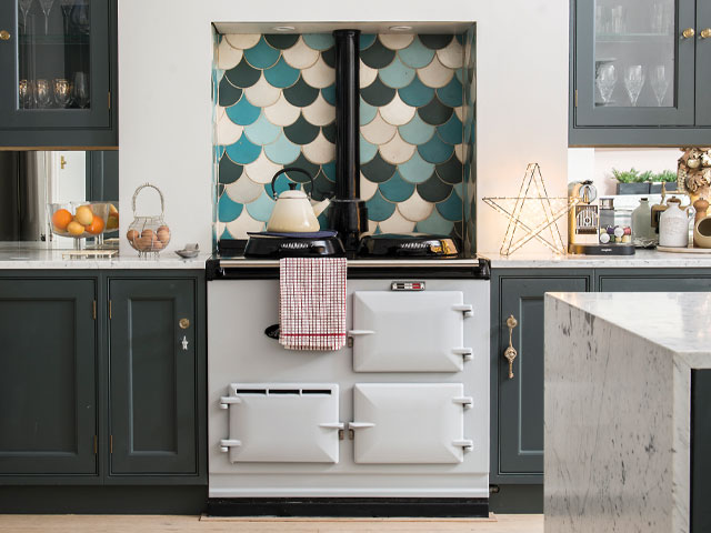 aga in period house kitchen extension with aqua marine kitchen cabinets and splashback tiles