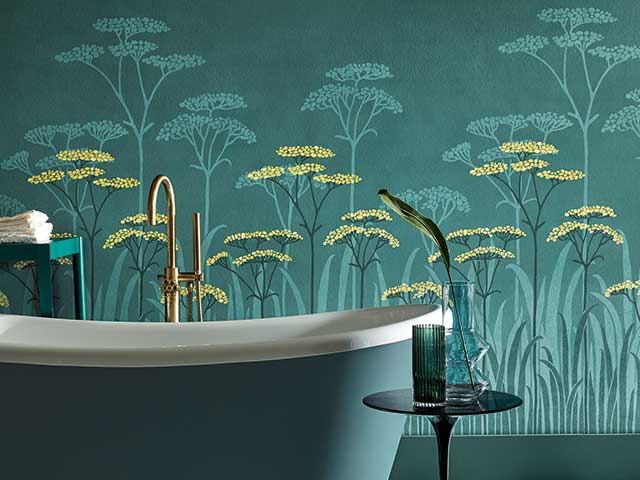Green bathroom feature wallpaper and freestanding bath