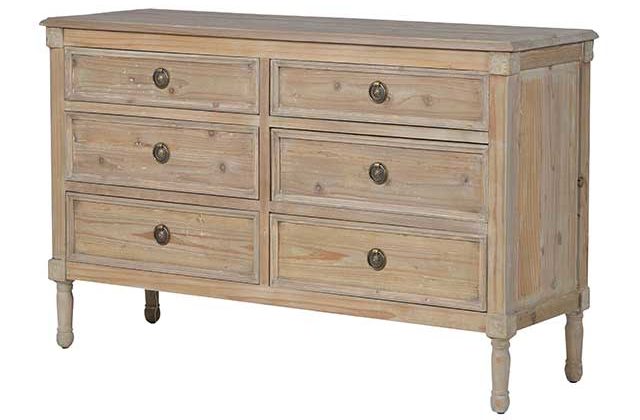 Antique wooden drawers with brass handles on white background