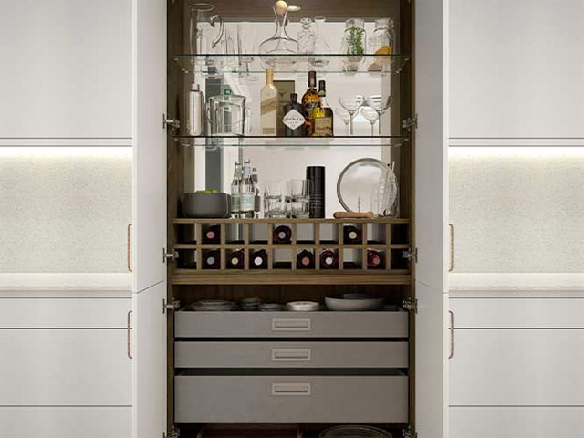 drinks cabinet with mirrored back panel in a modern kitchen