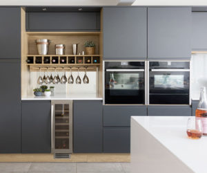 modern grey kitchen cabinets with open wine rack and glass storage 