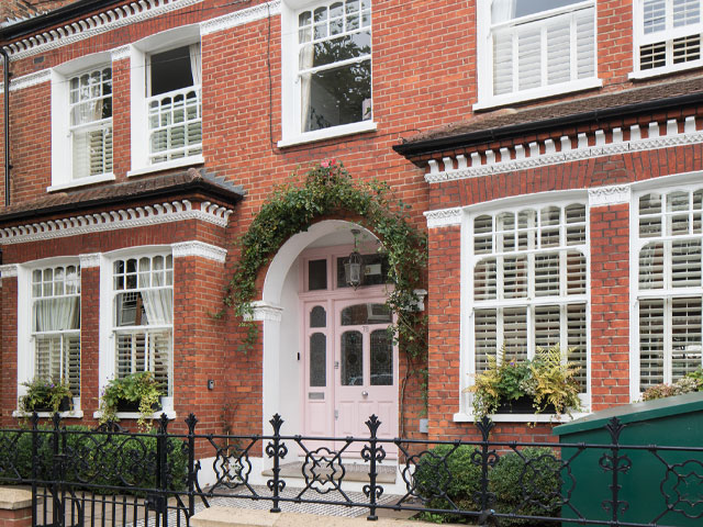 Lara Cross's Balham home with pink door