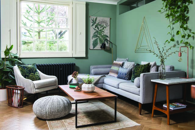 Various shades of green and teal create continuity in this London townhouse interior decor scheme