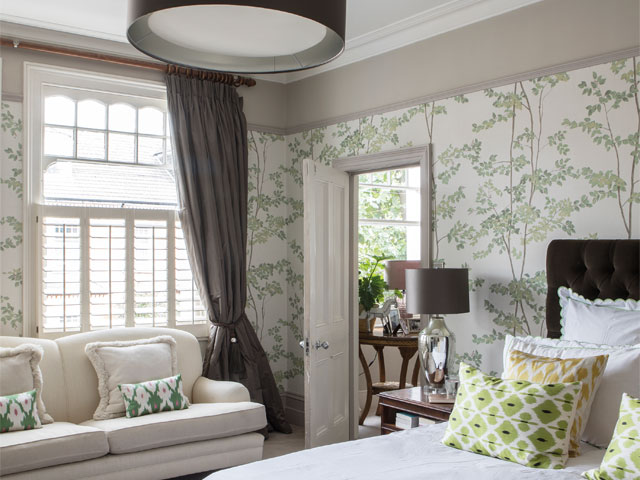 pale print bedroom bedroom wallpaper with neutral and pale green colour palette