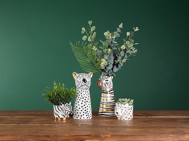 Zebra print 70s boho vase with flowers in