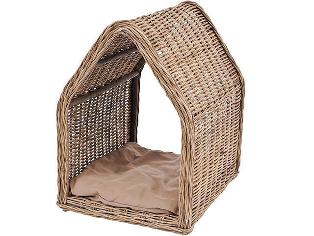 Rattan dog kennel on white background