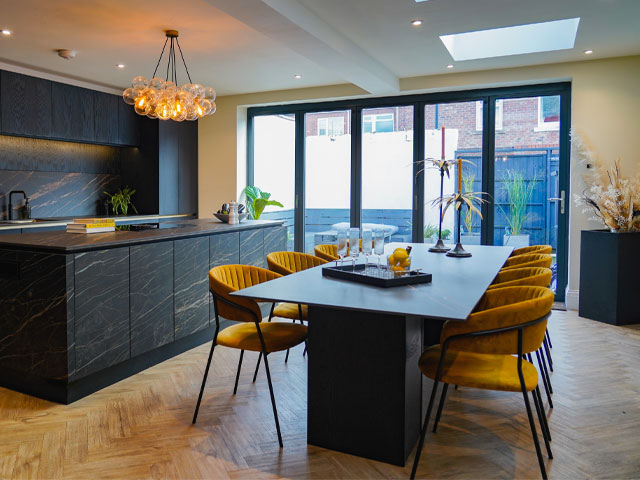 bubble chandelier styling ideas: a statement pendant light in an open-plan kitchen diner