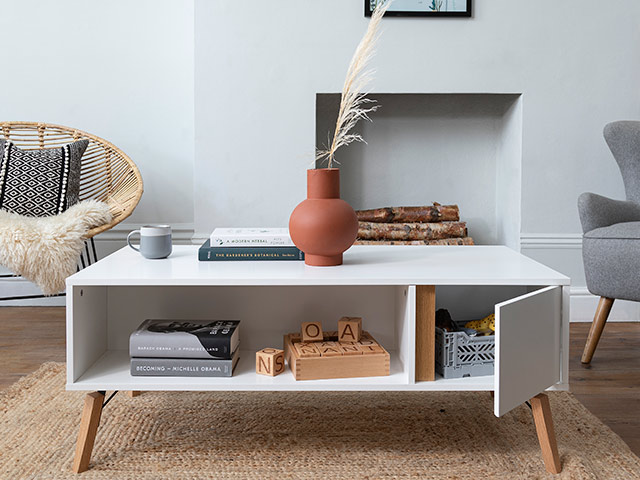 Living room storage coffee table with hidden compartments in cream and natural space