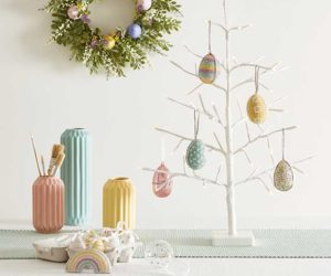 Easter decorations white tree with hanging coloured egg decorations