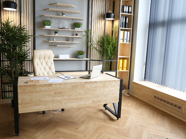engineered wood flooring in a herringbone pattern in a home office in neutral palette