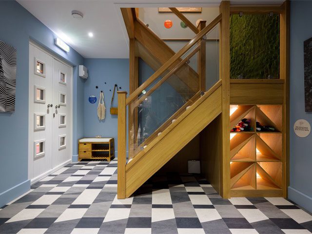 Future Living Home, wine rack under the stairs