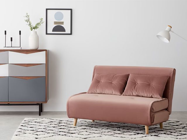 Pink velvet-finish fold-down sofa-bed from Made.com