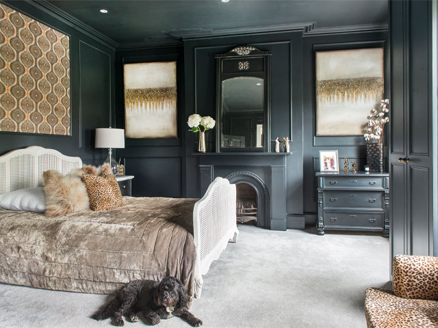 period bedroom decorated in dark green with gold and leopard print