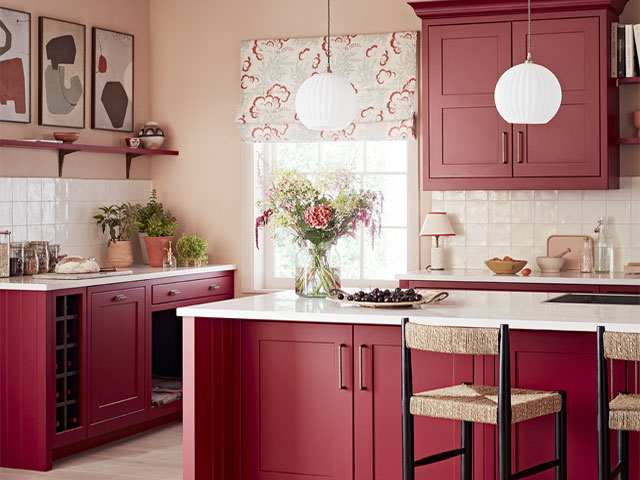 raspberry pink/red kitchen by Kitchen Makers