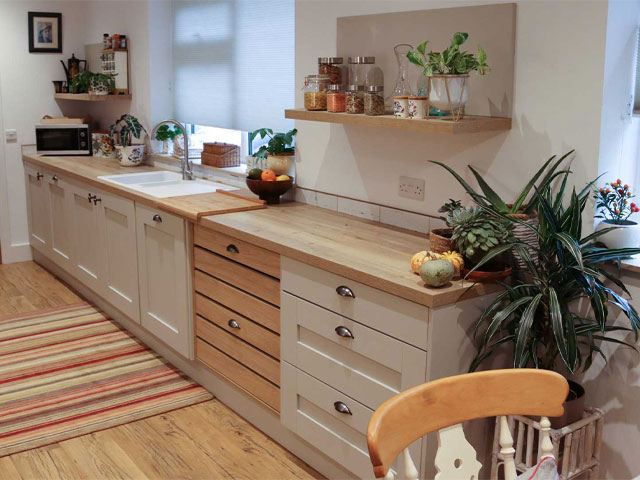 warm wood accents grey kitchen