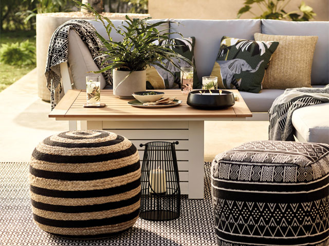 garden ideas from Marks and Spencer: decorate you outdoor space as you would indoors with cushions, throws and rugs