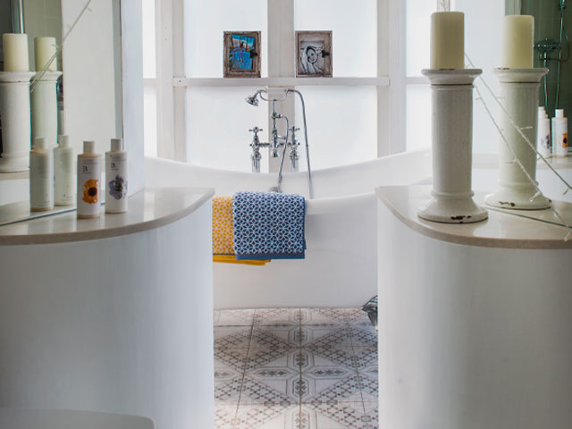 converted bathroom with rolltop tub and views over the Bristol Channel