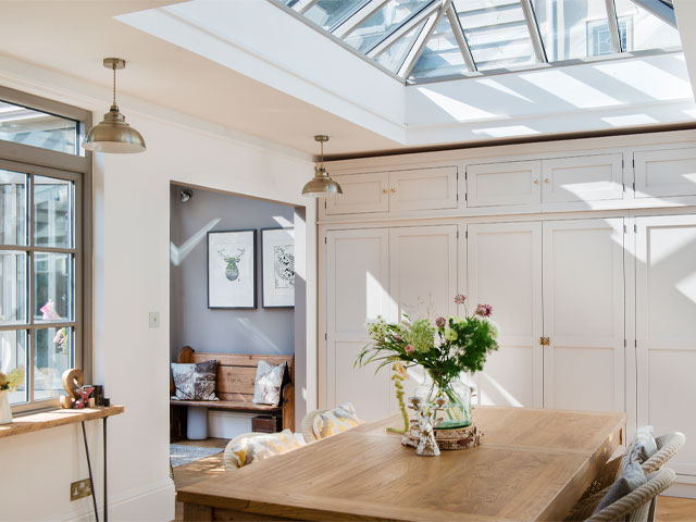 dining room with large glass rooflight over the dining table