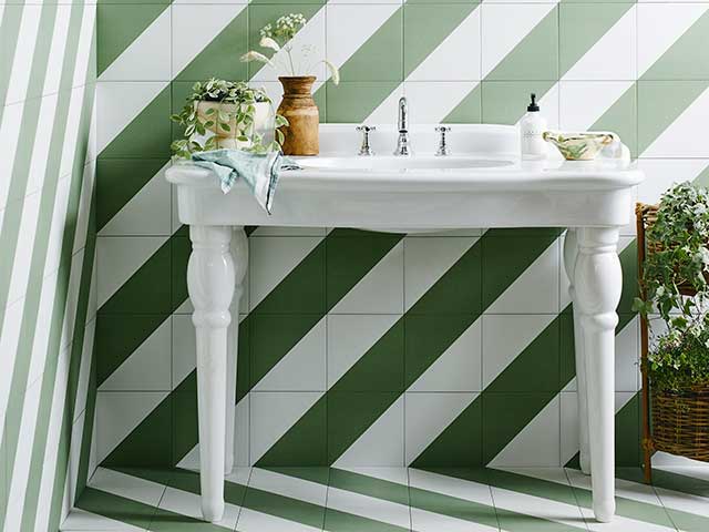 Green and white striped patterned bathroom tiles