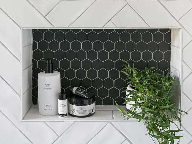 white tiles shelves with bathroom patterned