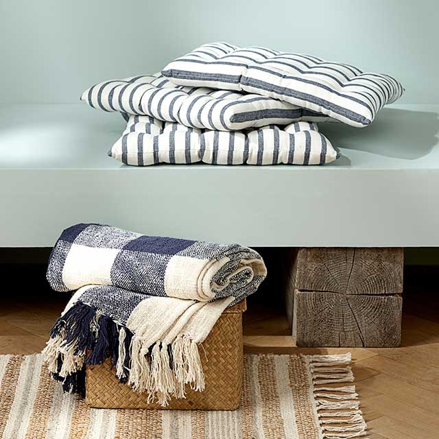 coastal grandma striped linens on shelves