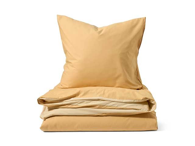 linen bedding on white background