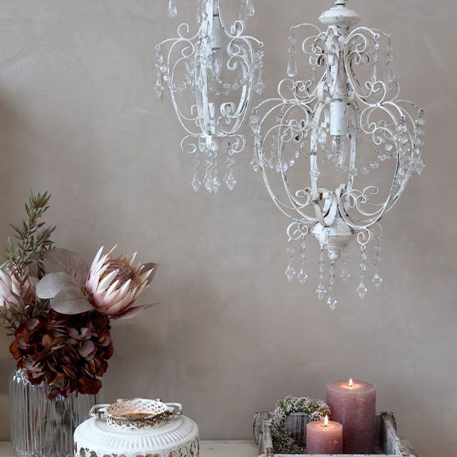 antique french style chandelier in distressed white
