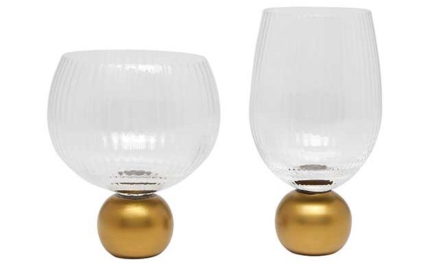 gold ball glasses on white background