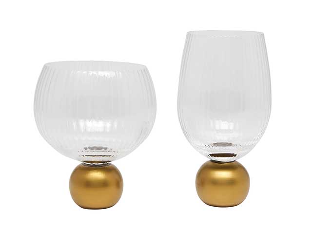 gold ball glasses on white background
