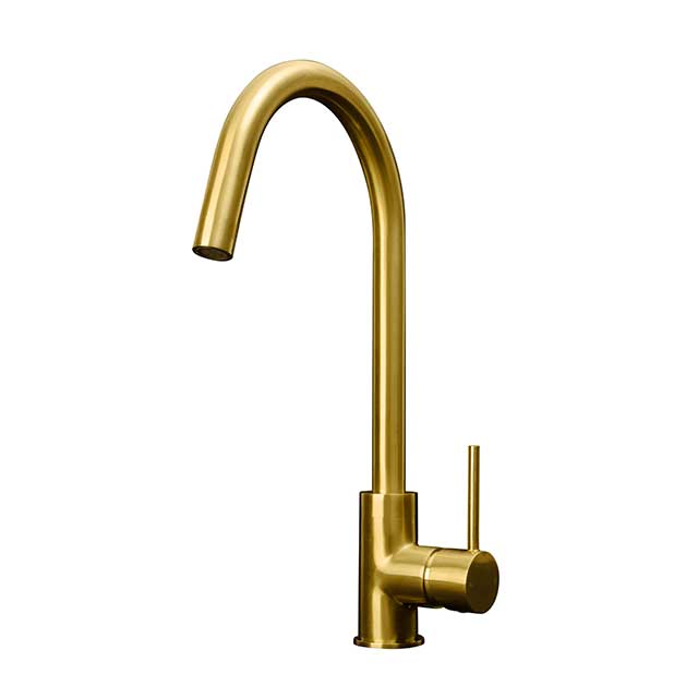 gold kitchen tap on white background