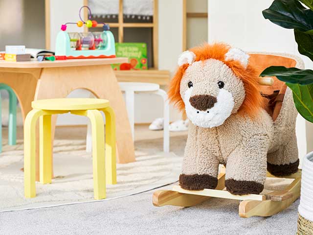 Georgia Kousoulou playroom with lion rocker and play table