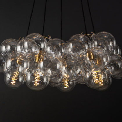clear bubble chandelier from dowsing and reynolds on black background
