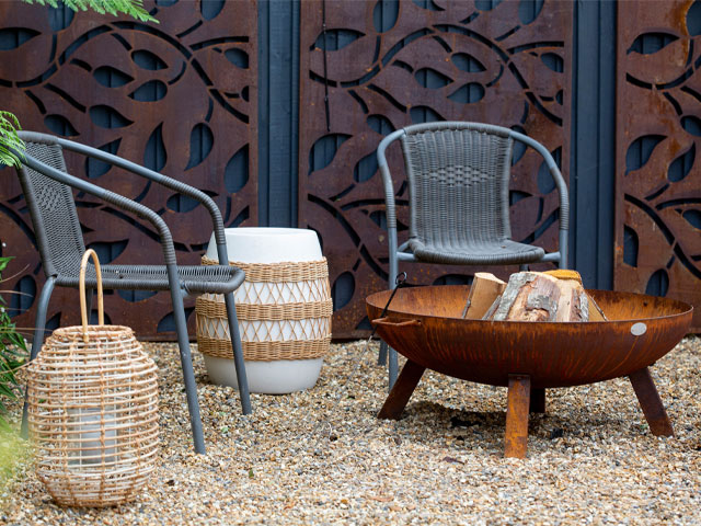 garden makeover with firepit area and outdoor kitchen