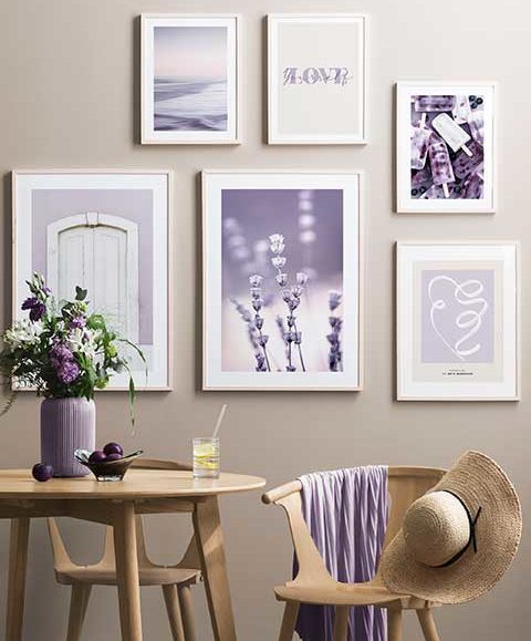 Lavender decor ideas wall art frames above dining table with floral vase