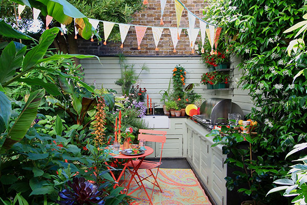 Outdoor kitchen surrounded by greenery