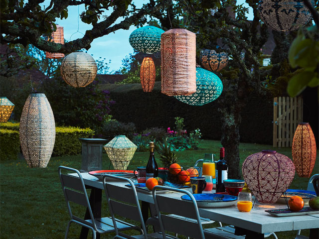 outdoor living: solar hanging lanterns in bright colours for alfresco dining