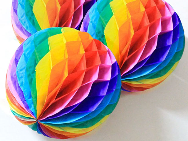 pride decoration ideas: rainbow paper honeycomb decorations etsy