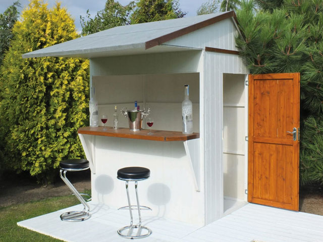 garden bar painted white with pitched roof and serving hatch