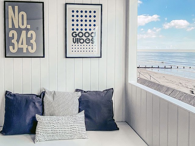 Cushions and wall art adds interest to your beach hut