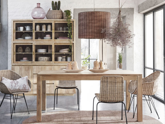 rattan chairs and wooden dining table in a neutral dining room scheme