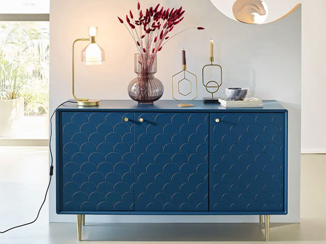 scallop shaped decor: navy sideboard with scallop detail in modern hallway
