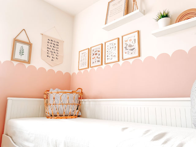 scallop shape decor ideas: scallop-edge paint effect in pink created using a stencil sticker