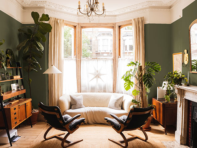 Dark green shades create a cosy atmosphere in the Laura Jackson x COAT paint collaboration