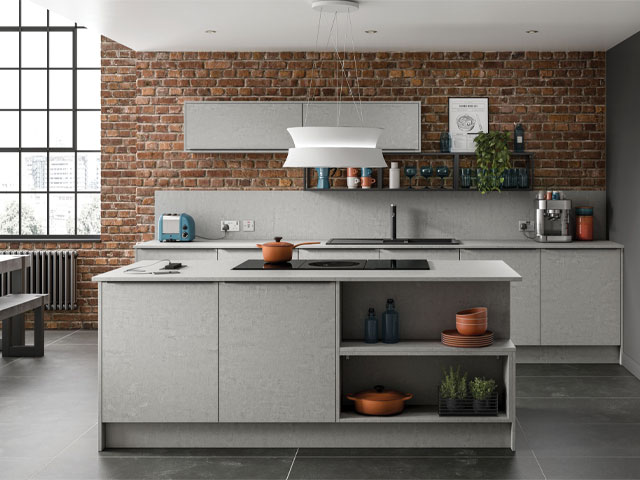 concrete kitchen island with open corner shelving for casserole dishes